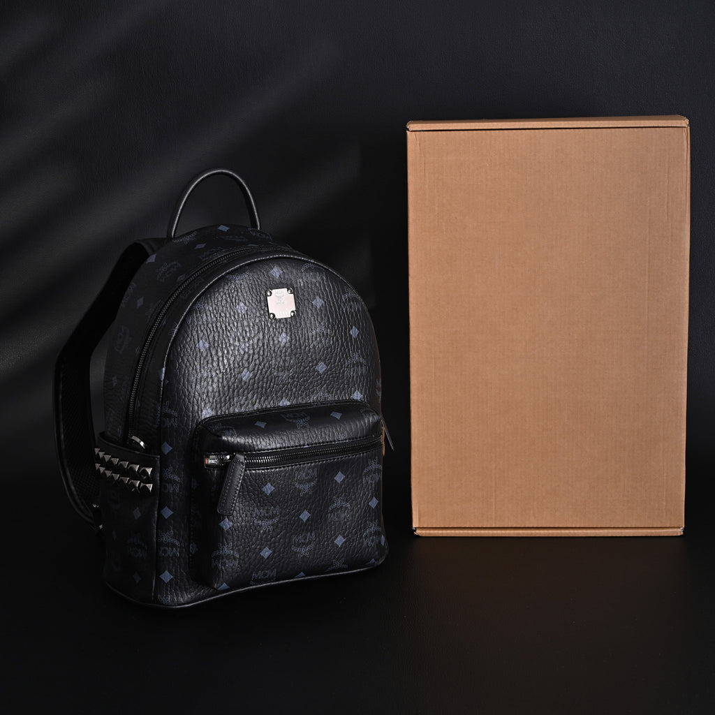 MCM Stark Visetos Medium Backpack – Black Monogram with Studded Detailing