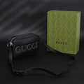 Gucci Black Leather Embossed Logo Belt Bag